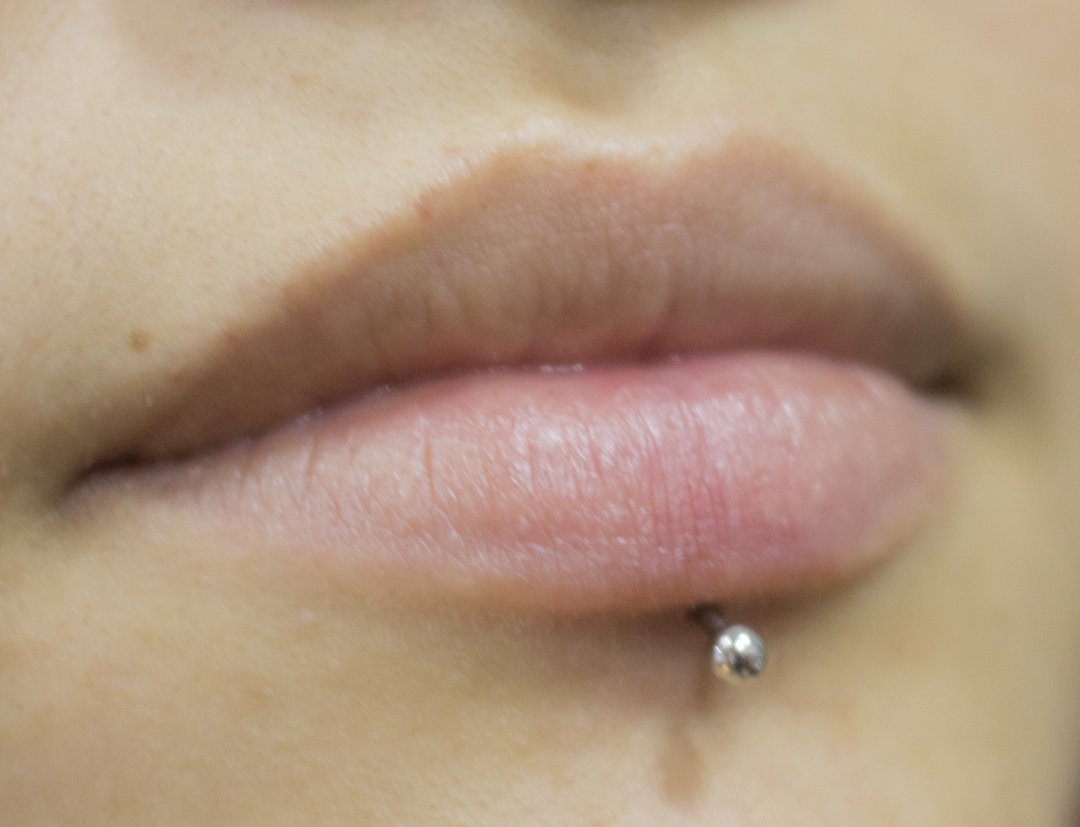 Perforación labret