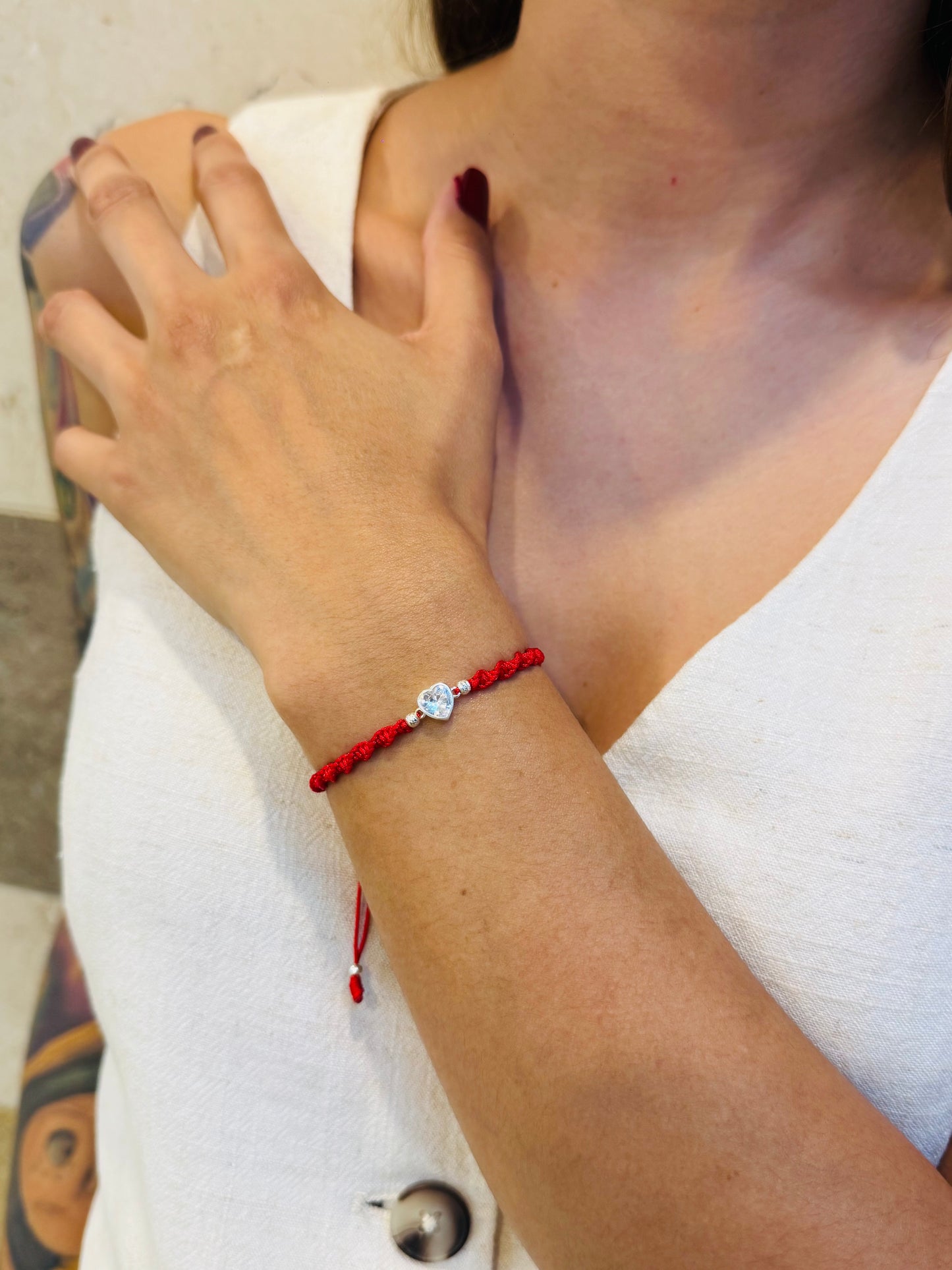 PULSERA TEJIDA CORAZON PLATA